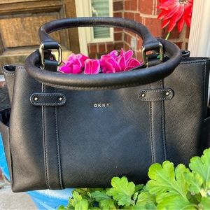 DKNY Black Saffiano Satchel with magnetic closure and gold logo & hardware.